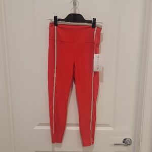 Vibrant Orange/Red Leggings with Beige Stripe